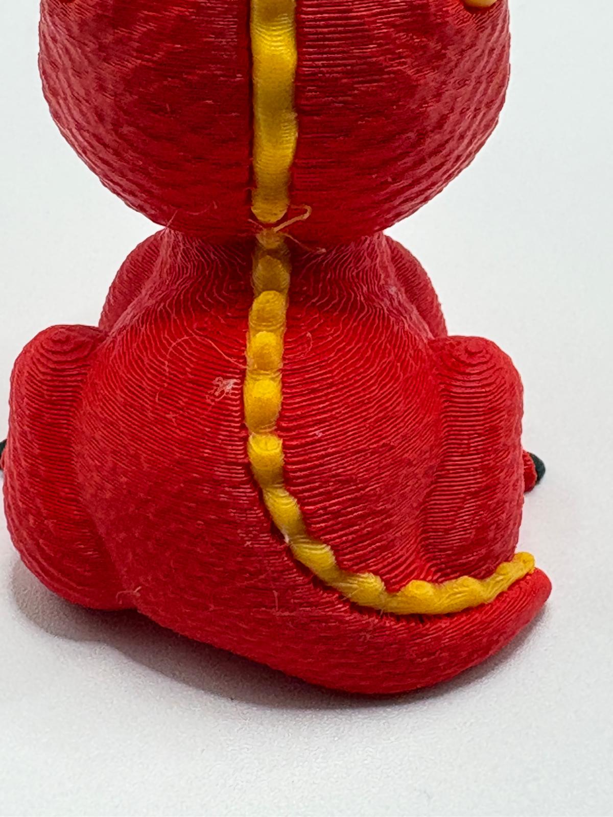 Rear view before adjustment showing an uneven yellow spine edge and a few loose strands